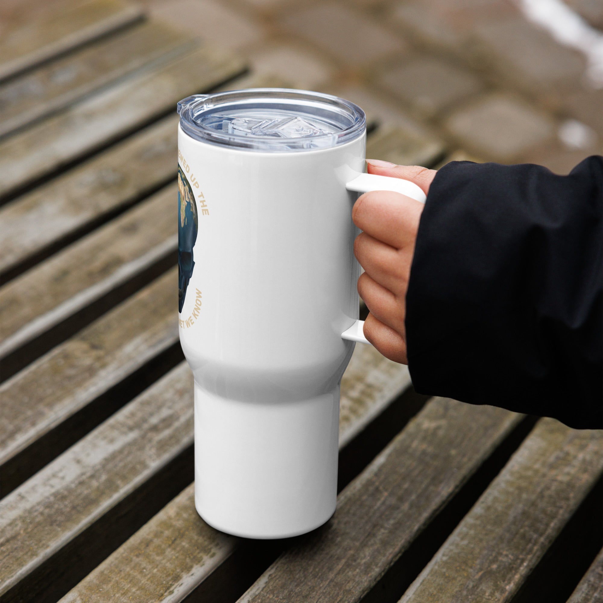 Travel mug with a handle and climate change logo